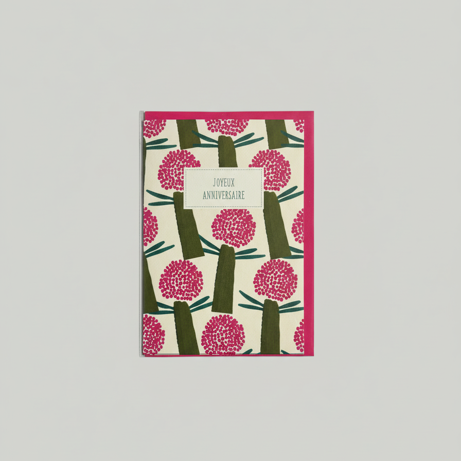 Card with pink floral design on a beige background