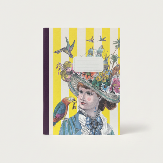 Notebook with a colorful design of a woman wearing a large hat with birds and a parrot on a yellow and white striped background.