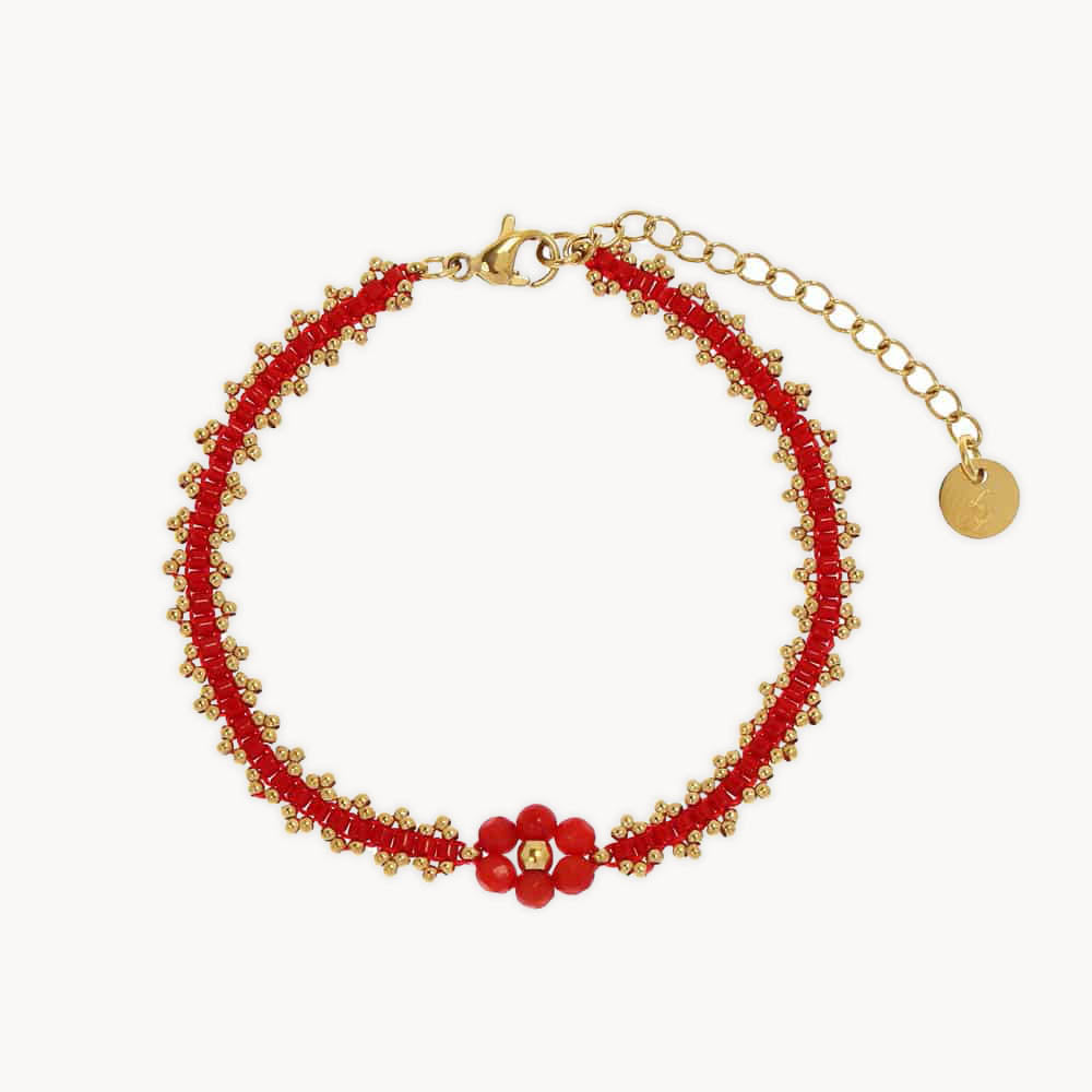 Red beaded bracelet with gold accents