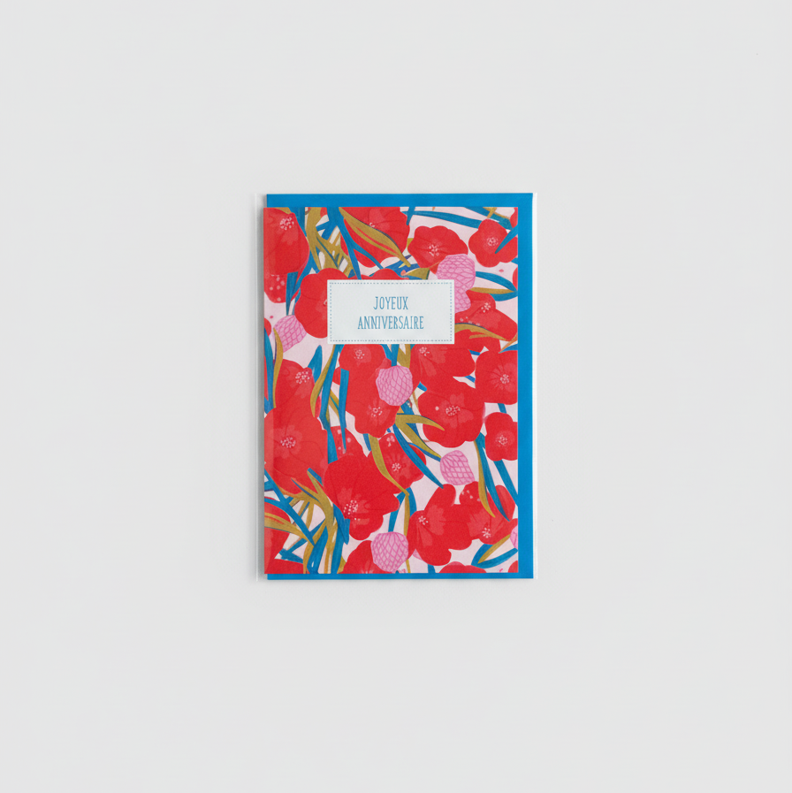 Floral birthday greeting card with a blue envelope