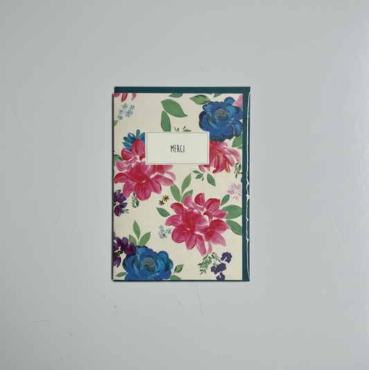 Floral Greeting card with 'Merci' on a gray background