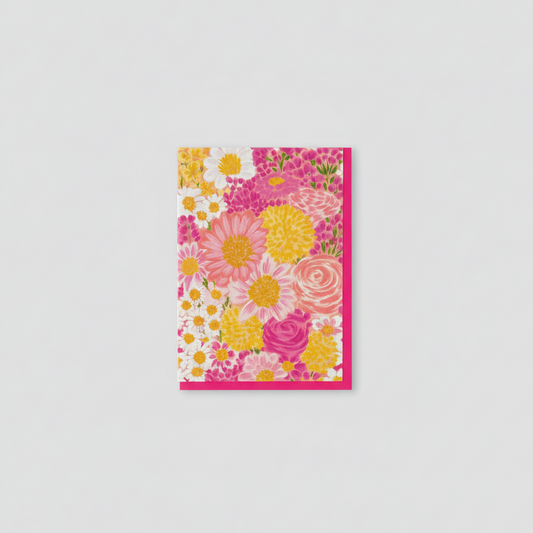 Floral greeting card with pink and yellow flowers and pink envelope