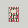 Card with pink floral design on a beige background