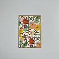 Card with colorful floral design on a white background