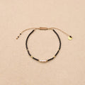 Karuna Pearl Sliding knot Black Bracelet