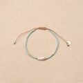 Karuna Pearl Sliding knot Blue Bracelet