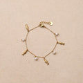 Syrene Pearl fish Charms Bracelet