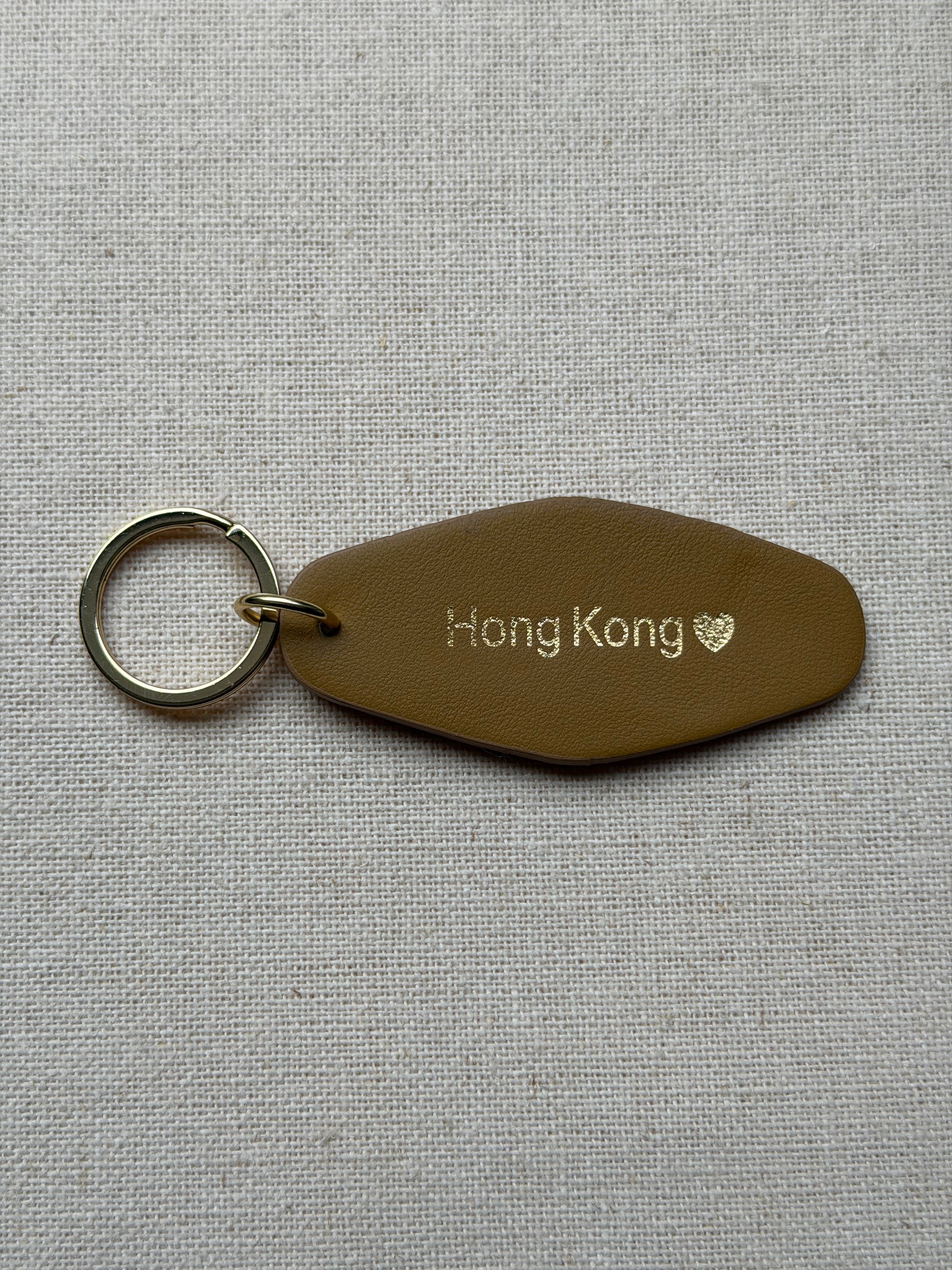 Beige Leather Keychain with Hong Kong on it