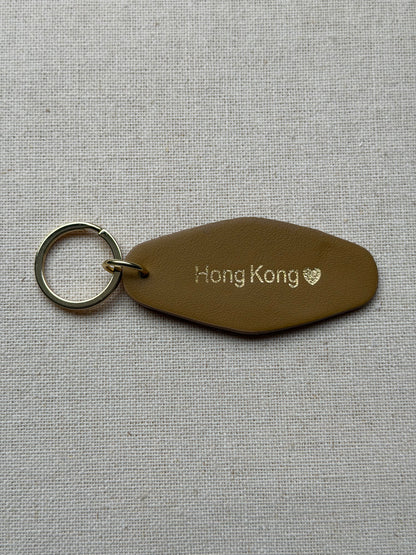 Beige Leather Keychain with Hong Kong on it