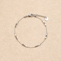 Lye Cylindrical Beads Silver Bracelet