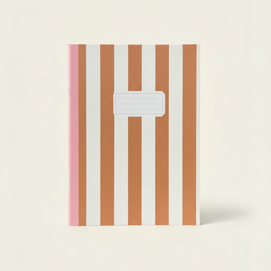 Notebook with pink and brown striped cover on a white background