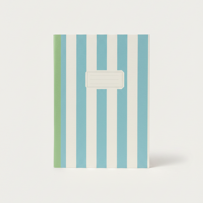 Notebook with blue and green striped cover on a white background