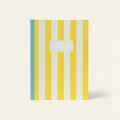 Notebook with yellow and blue striped cover on a white background