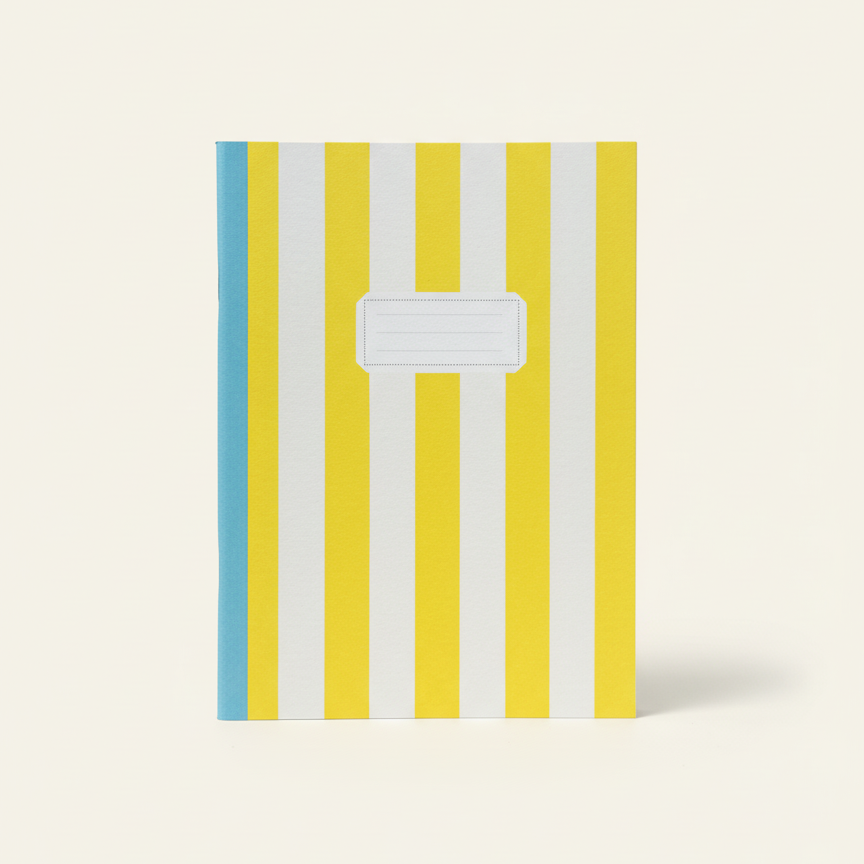 Notebook with yellow and blue striped cover on a white background