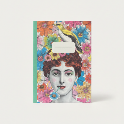 Notebook with a colorful design featuring a woman's face and flowers on a white background