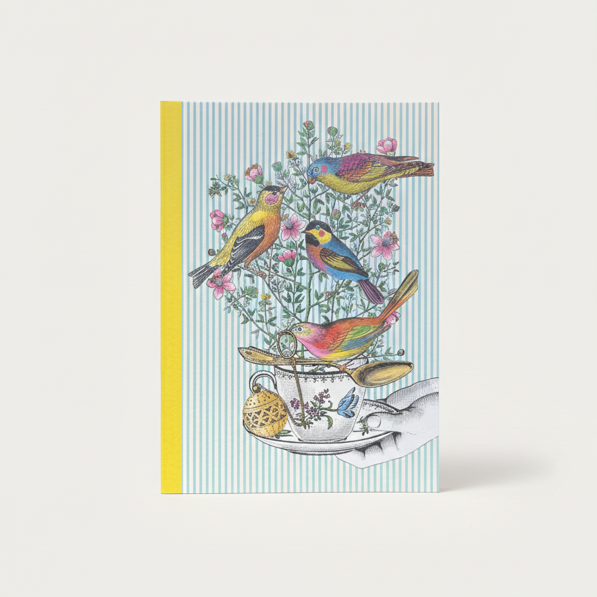Notebook with colorful bird design on a white background