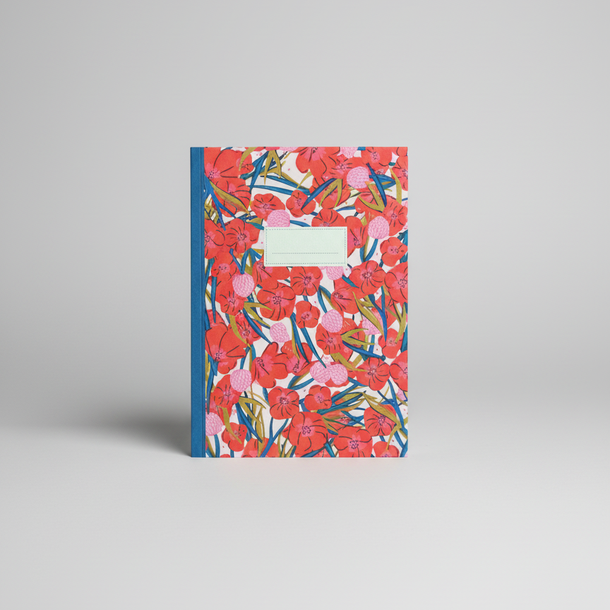 Floral notebook with a blue spine on a gray background