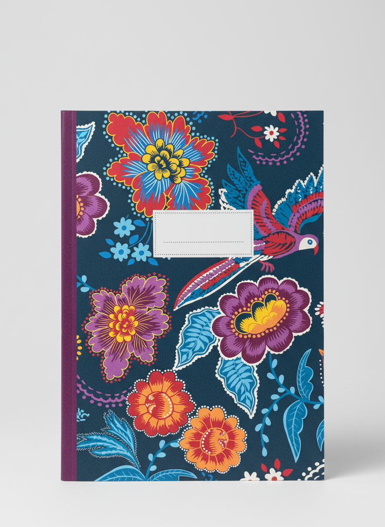 Notebook with colorful floral and bird design on a blue background