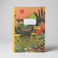 Notebook with a colorful garden illustration on a white background